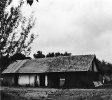 A stable connected with a barn