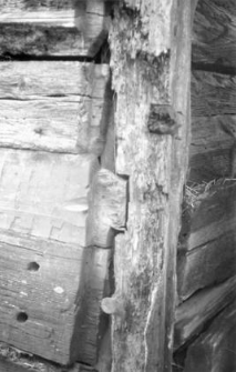 A fragment of a post-and-plank barns wall
