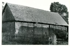 A half post-and-plank barn