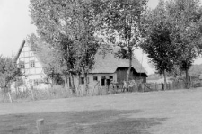 A residential building and a farm building