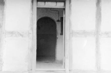 A treshold and an entrance to a kitchen