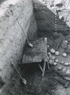 Deep trench outside the collegiate church (from the south), wooden structure of the rampart from the east, view from above on the trench during examination