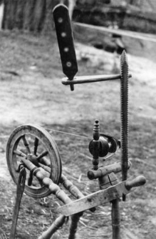 distaff on a spinning wheel